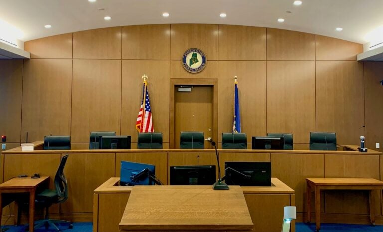 empty courtroom bench demonstrating minimalist courtroom av design